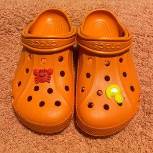 Womens size 7 crocs - orange